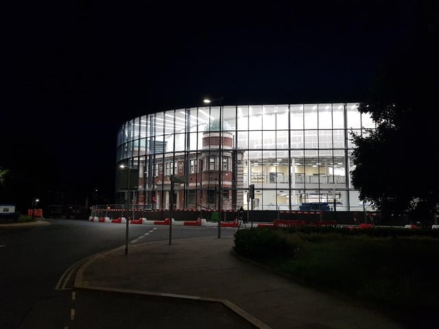 The illuminated frontage of the Doncaster Gallery, Library and Museum viewed from Wood Street