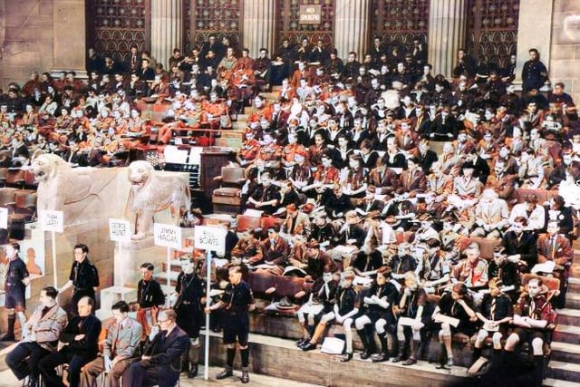 A rally at Sheffield City Hall in 1947. The computer AI added colour to the picture
