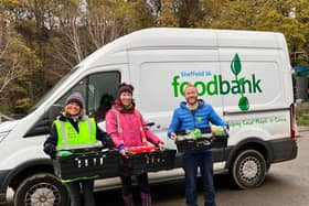 Colette Waters, Kate Scott and Peter Gilbert with donations for Sheffield S6 Foodbank