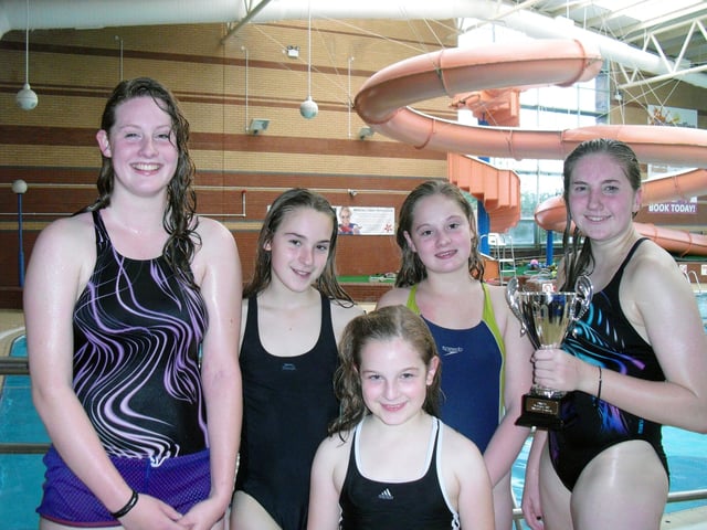 Selby Tiger Sharks pictured at the 2011 Doncaster gala are (back, from left) Hannah Buckley, Samantha Owen, Lauren Buckley, Annabelle Owen and Emma Tune with her trophy for Top Girl.