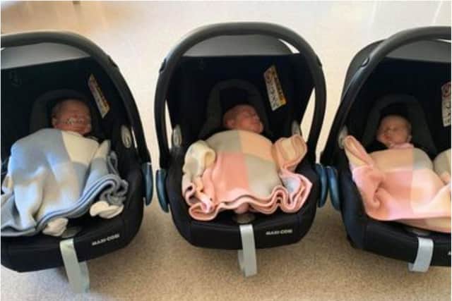 Triplets George, Olivia and Ella were born in April
