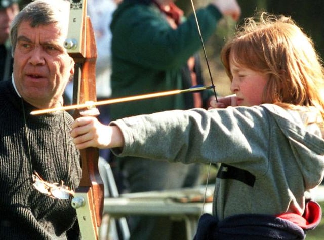 Charlotte Tonge having a go at archery at the Sandall Beat Woods in 2000.