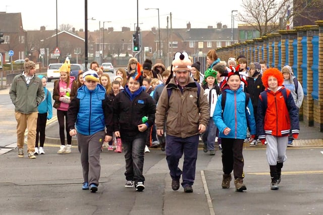 Students from St. Hild's School on King Oswy Drive held a sponsored walk to benefit the Hartlepool RNLI in 2013.Teacher Tom Bisset (centre) was seen leading the walk.