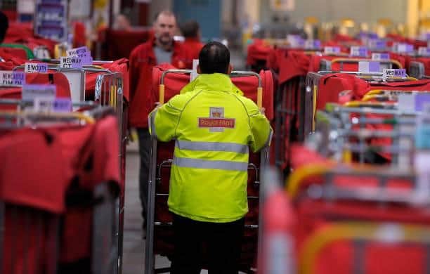 These are the final dates for Christmas postage at Royal Mail, including first and second class letters and parcels, and international delivery. Photo by ANDY BUCHANAN/AFP via Getty Images.