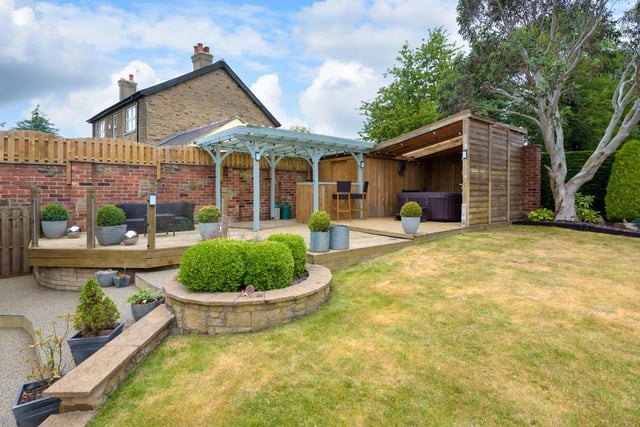The garden's decked areas look lovely and are a fantastic space to put a hot tub and seating to help you enjoy the outdoors.