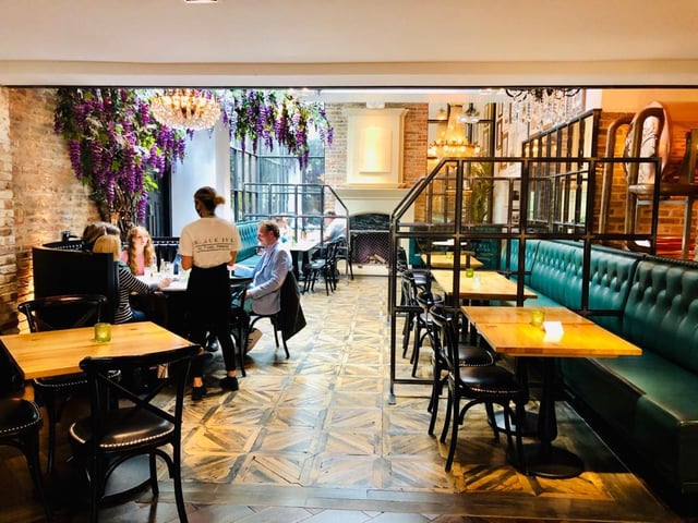 Black Ivy has reopened and staff are wearing PPE to serve visitors and perspex glass is separating tables