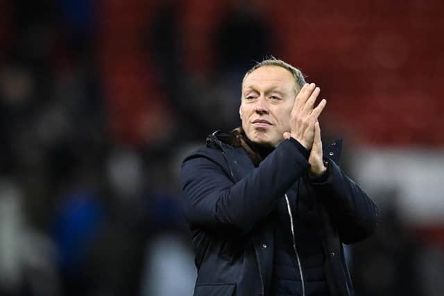Nottingham Forest manager Steve Cooper applauds the supporters( JUSTIN TALLIS/AFP via Getty Images)