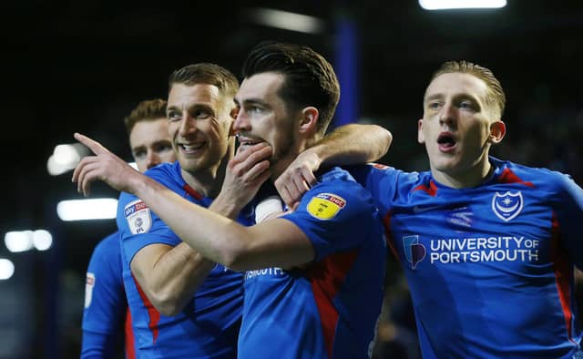 Portsmouth's John Marquis scores his first goal of the match