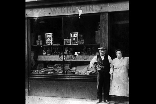 William King from Hayling Island, sent this photograph to us of his grandparents Mr and Mrs W Griffin, standing outside their small grocer's shop in Buckland