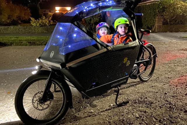 Rachel Evans's cargo bike with her kids at night