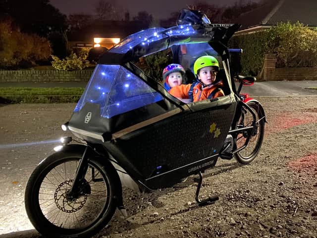Rachel Evans's cargo bike with her kids at night