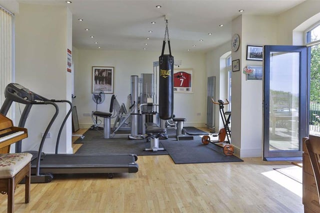 The converted coach house has been modernly furnished and benefits from its own home office and gymnasium.