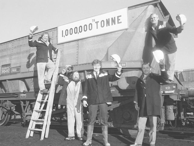 Allan Clark (right), deputy manager of Wearmouth Colliery, and fellow miners celebrate the lifting of one million tons of coal in January 1987.