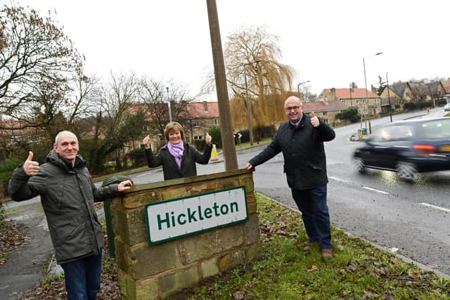Councillor Cynthia Ransome, Richard Clark, Chairman of Hickleton Bypass Action Group and Parish Councillor Gordon Wordsworth, celebrate after successfully campaigning for Speed Cameras on the A635.