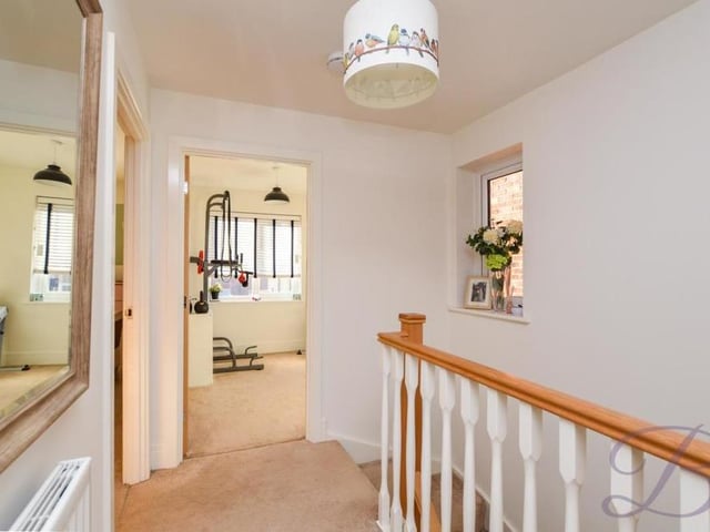 We are heading upstairs now, to be greeted by the this bright landing, which gives access to the three bedrooms.