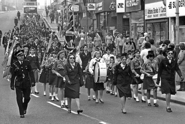 The 43rd (St Margaret's) Girl Guides band leads the parade down Fowler Street on its way to St Hilda's Church for the Guide movement's 75th anniversary thanksgiving service 35 years ago.