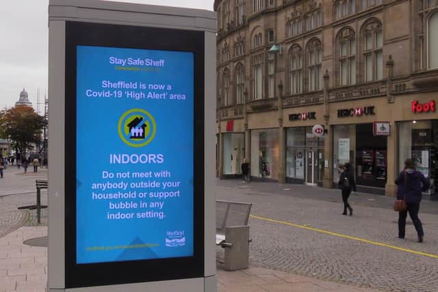 A coronavirus advice sign in Sheffield city centre, South Yorkshire, the latest region to move into Tier 3 coronavirus restrictions, which came into effect just after midnight on Saturday.