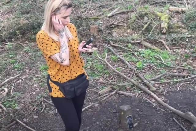 Hayley Whitehouse taking readings during WAH Paranormal's investigation at the former POW camp at Redmires Road, Lodge Moor. Picture: WAH Paranormal