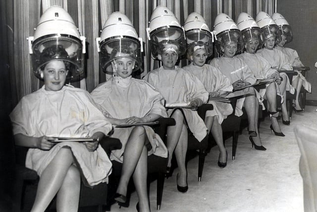 Sheffield United wives have their hair done at the Andre Bernard Salon on The Moor in February 1962. Pictured, from left, are Pat Summers, Dorian Kettleborough, Hetties Shaw, Marie Hartle, Beryl Shaw, Mary Simpson, Shirley Richardson, Ina Hodgson and Brenda Hodgkinson.