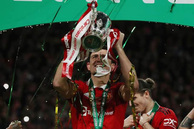 Harry Maguire of Manchester United has had a lot to celebrate through his career - including winning the Carabao Cup trophy on February 26, 2023. Photo: Paul Terry / Sportimage