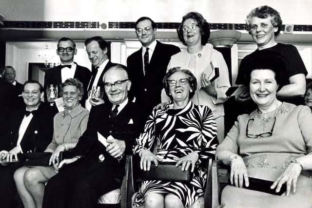 The staff of the Grand Hotel, Sheffield, had a farewell party just before it closed down and long service awards were made to nine of them. 
Pictured from right to left (seated): Miss Doris Collier, Mrs Mable Ibbertson, Mr Eddie O'Neill, Mrs Ada Thompson and Mr Dennis Wilson.  Standing: Miss Mary Blair, Miss Joan Higginson, Mr Clive Bond, Manager of the Grand, Mr Peter Price and Mr Stuart Heywood, February 23, 1971