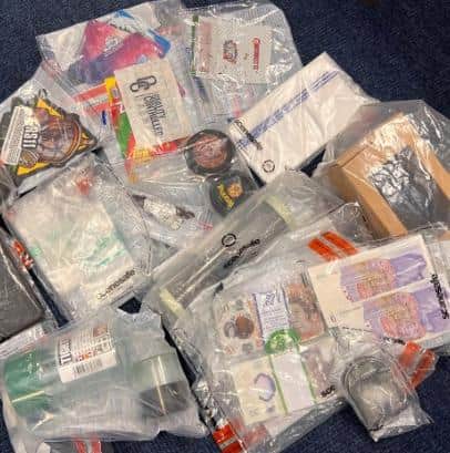Some of the cash and other items seized by police last week