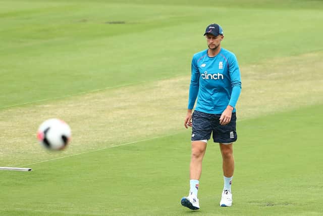 Joe Root inspects the pitch ahead of the start of the Ashes this week (Photo by Chris Hyde/Getty Images)