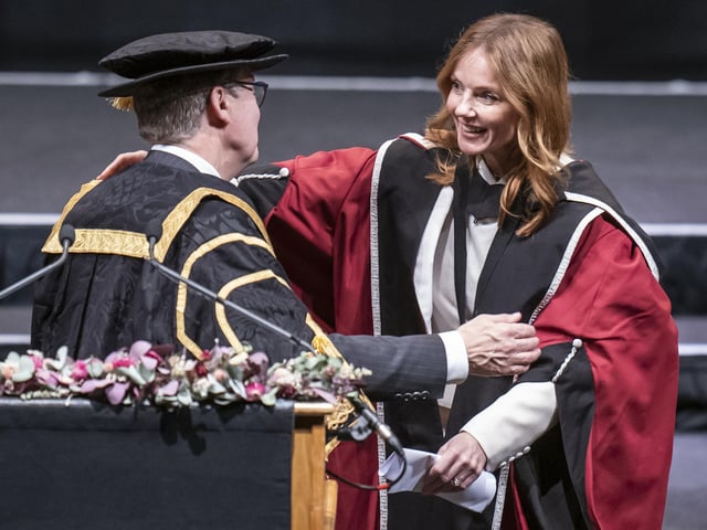Vice Chancellor of Sheffield Hallam University Chris Husbands (left) congratulates Geri Halliwell-Horner (right) after she received an honorary doctorate from Sheffield Hallam University at Ponds Forge International Sports Centre in Sheffield. Picture date: Tuesday November 22, 2022.