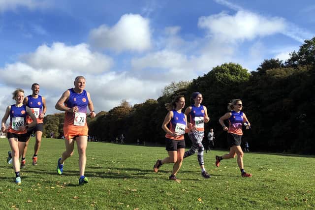 Members of Hillsborough & Rivelin Running Club warming up before last weekend's Northern Cross Country relays at Graves Park
