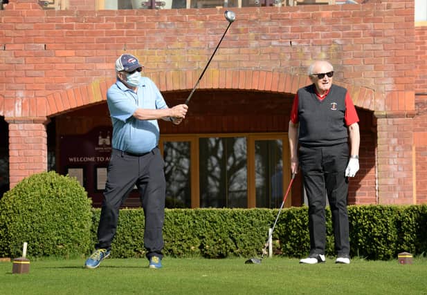 Graham Bassinder and Norman Haste get their round underway.