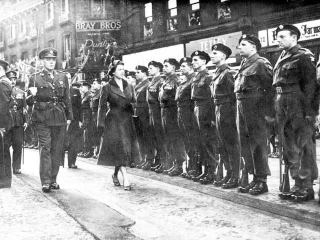 Frank Bryan of Herdings Park, Sheffield, is one of the soldiers standing to attention at the official visit of Queen Elizabeth II to the city in 1953