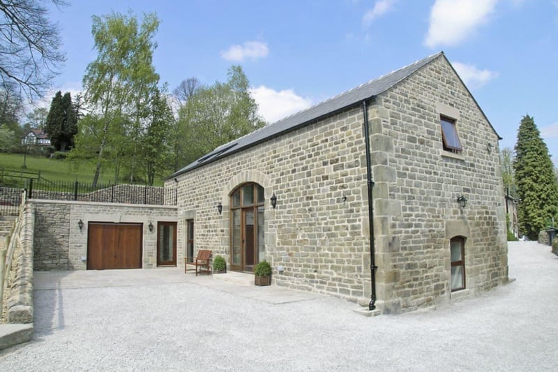 Tythe Barn, at Grindleford, sleeps eight and is a detached barn that has been built ‘upside down’ - with bedrooms downstairs and living space upstairs - to take advantage of the countryside views. (https://www.cottages.com/cottages/tythe-barn-rhh8)