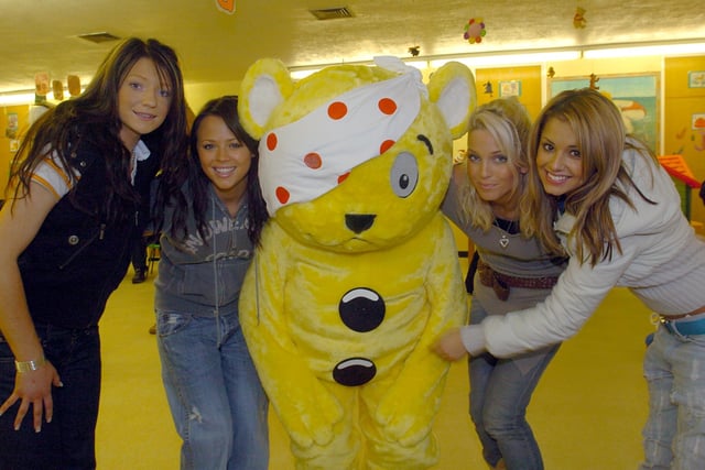 Pudsey is pictured posing with Nicola Roberts, Kimberly Walsh, Sarah Harding and Cheryl Cole - four out of five members of former girl band Girls Aloud (Photo: JPIMedia)