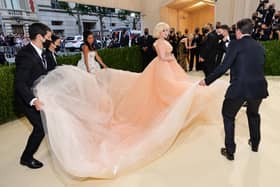 Billie Eilish's peach Oscar de la Renta gown takes cues from Grace Kelly. Photo by: Theo Wargo/Getty Images