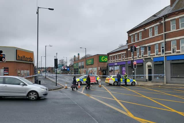 Queens Road in Sheffield is closed this morning after a fight in which an 18-year-old man was seriously injured (Photo: Robert Cumber)