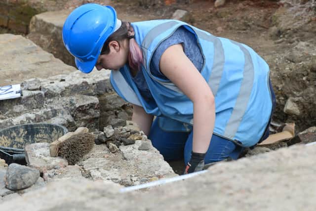 Work is carried out on one of the trenches at the Sheffield Castle dig. Picture: Marie Caley.