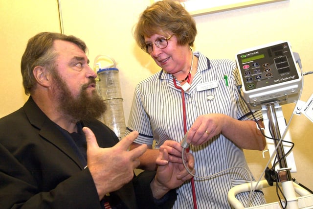 Mexborough born Actor Brian Blessed returned to South Yorks to open the, Chatsfield Suite, Doncaster Royal Infirmary's new Chemotherapy Unit in 2002. Pictured is Brain with Joyce Burman a Clinical Nurse Specalist at the centre