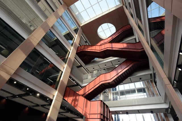 The central steel staircase is inspired by the city's industrial heritage.