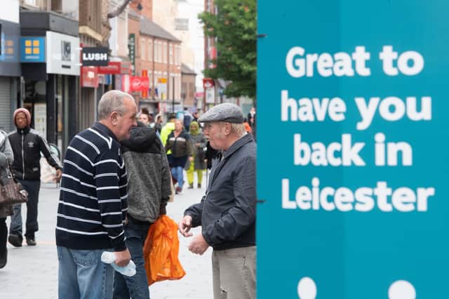 Signs in the centre of Leicester welcoming people back as the city - Joe Giddens/PA Wire
