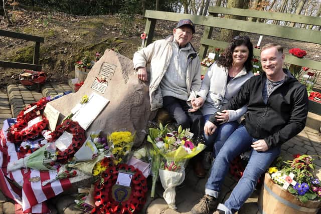 Mi Amigo Memorial Service,Endcliffe Park,Sheffield. Pictured is Tony Foulds sat on his beloved memorial with visitors from New York Steven and Tina Bartlett.