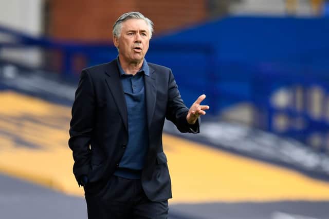 Everton's Italian head coach Carlo Ancelotti gestures on the sidelines: PETER POWELL/POOL/AFP via Getty Images