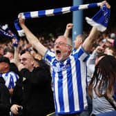 SHEFFIELD, ENGLAND - MAY 18: Fans of Sheffield Wednesday celebrate after the teams first goal during the Sky Bet League One Play-Off Semi-Final Second Leg match between Sheffield Wednesday and Peterborough United at Hillsborough on May 18, 2023 in Sheffield, England. (Photo by Matt McNulty/Getty Images)