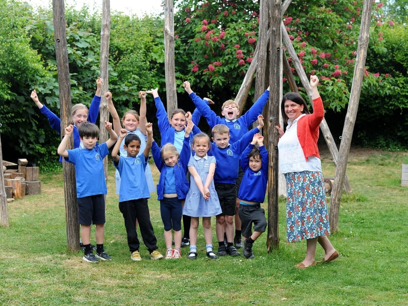 Hambledon Primary School in Church Lane, Hambledon, has received a positive result in their recent Ofsted report. The report was published on May 6, 2025. Pictured is: Adrienne Corr, headteacher of Hambledon Primary School with some of the children. Picture: Sarah Standing (130525-6736)