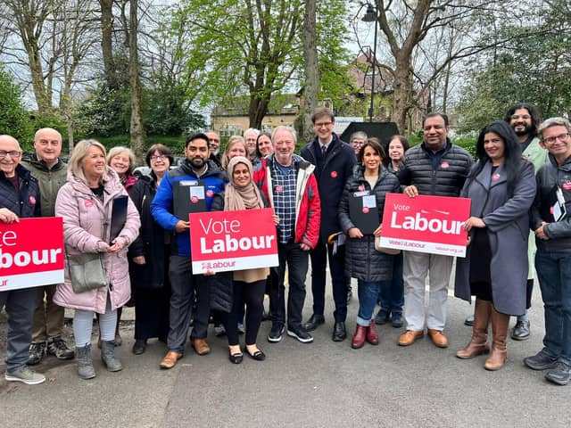 Sheffield City Council leader Tom Hunt, pictured eighth right with members of the Labour Party, said his team are delivering an ambitious plan.