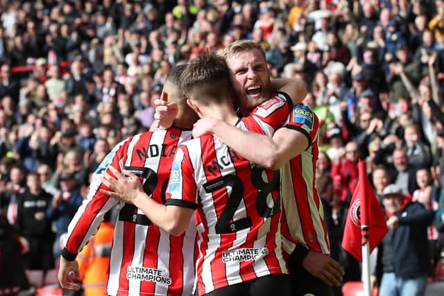 Oli McBurnie (right) and James McAtee (centre) are tied to Sheffield United until the end of the season: Jan Kruger/Getty Images