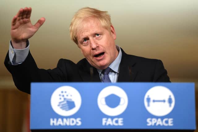 Britain's Prime Minister Boris Johnson speaks during a virtual press conference inside 10 Downing Street in central London