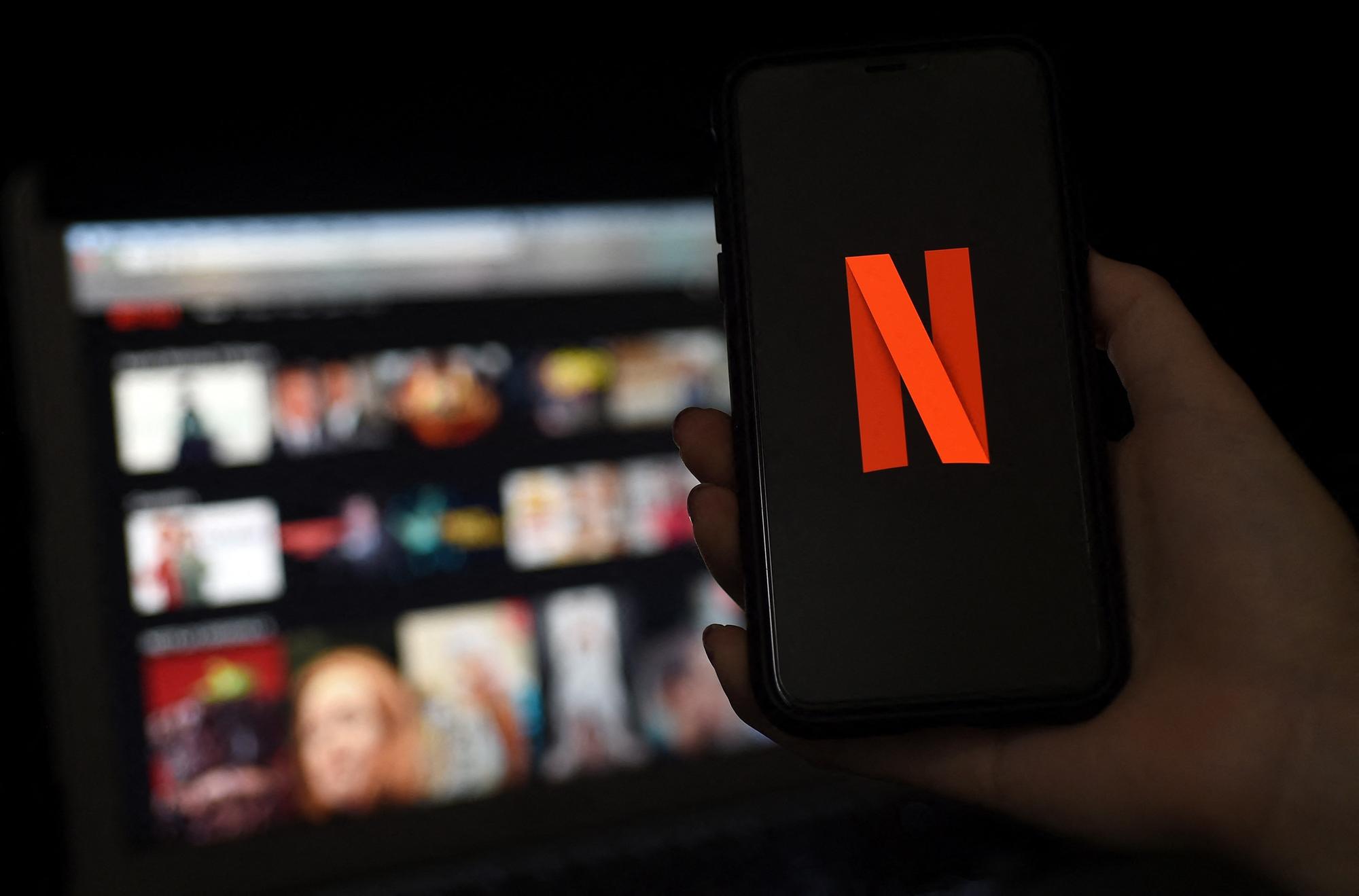 Still the world's premiere streamer, here are the 10 most expensive Netflix series ever, per episode cost. Picture: Olivier DOULIERY/AFP via Getty Images.