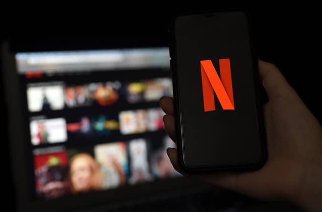 Still the world's premiere streamer, here are the 10 most expensive Netflix series ever, per episode cost. Picture: Olivier DOULIERY/AFP via Getty Images.
