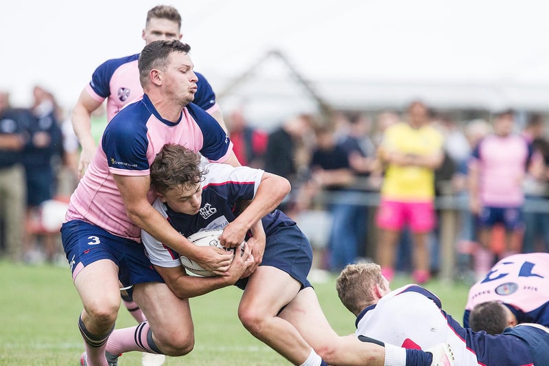 Selkirk's Ben Pickles going up against Hearts and Balls in the Peebles Sevens final (Pic: Bill McBurnie)