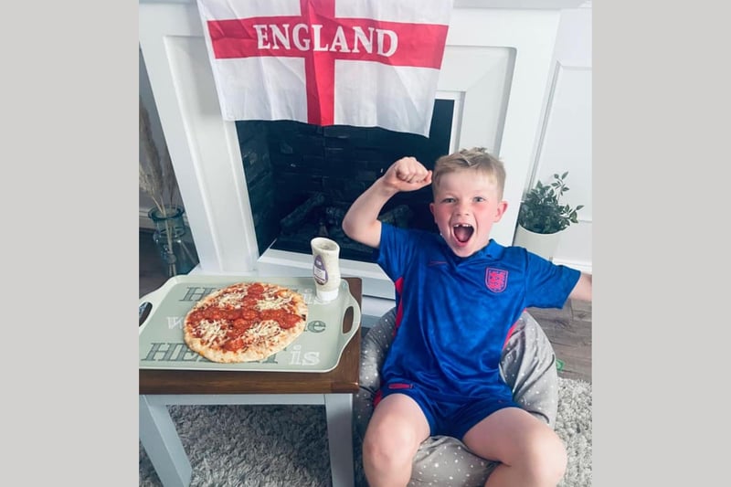 Max Bradley, age 7. We're loving his energy! (And his pizza).